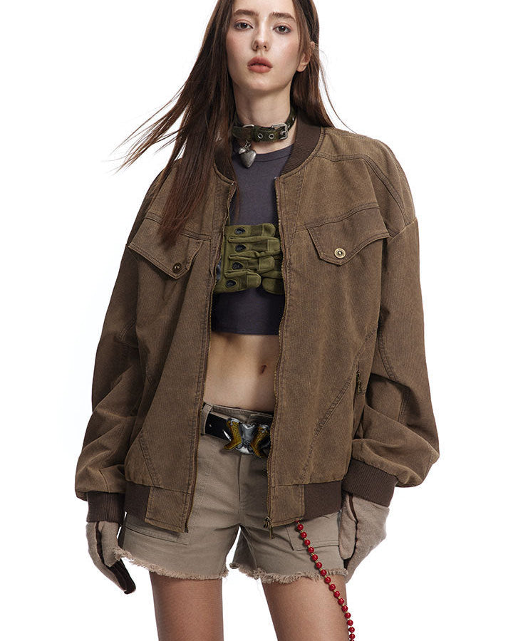 Brown Harrington jacket worn open showing flap chest pockets and panel seams