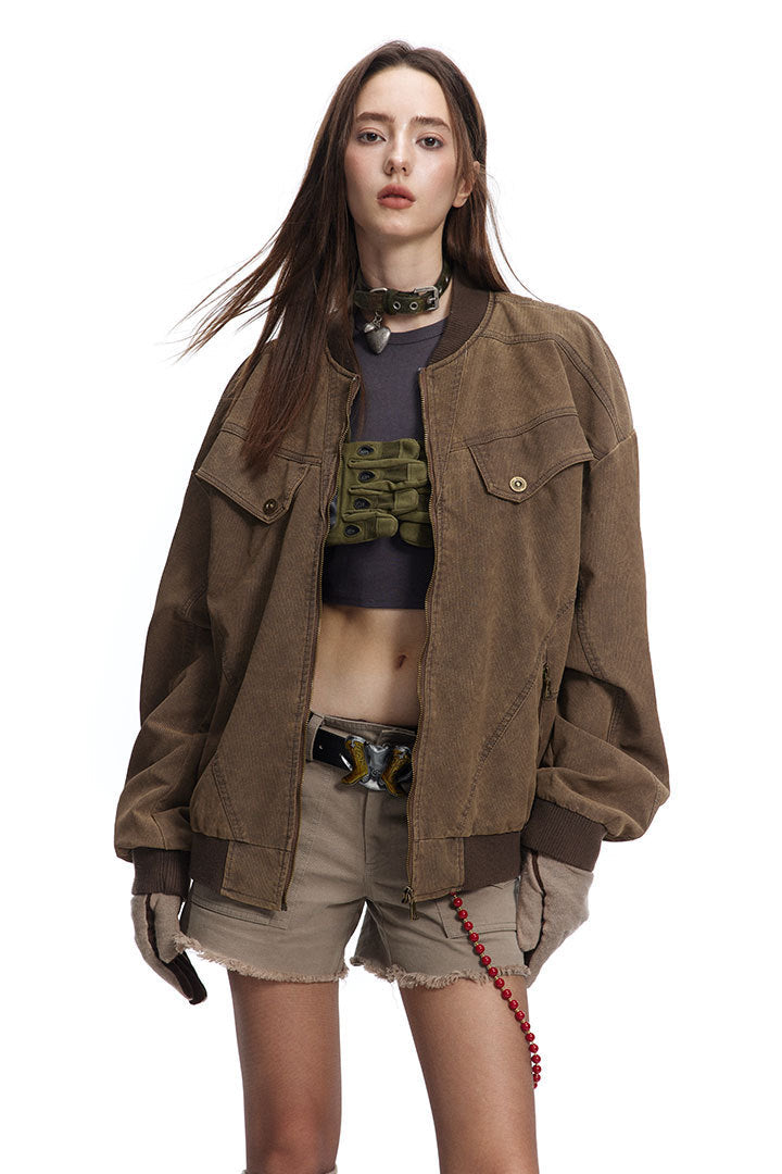 Brown Harrington jacket worn open showing flap chest pockets and panel seams