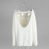 Back view of white backless knit sweater with scoop open back
