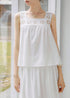 Front close-up of eyelet detail on white summer set