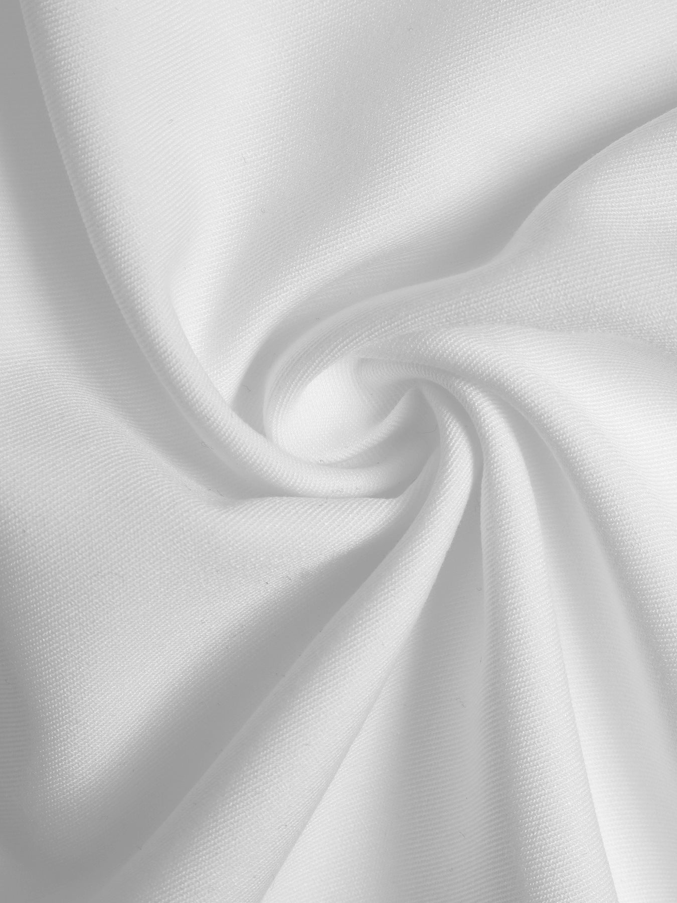 close-up of white fabric texture shown in twisted swirl