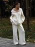 White half zip sweater 2 piece set with wide leg pants in forest setting