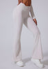 Side angle of white high waisted wide leg yoga pants