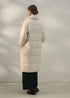 Cream over-knee quilted long coat back view