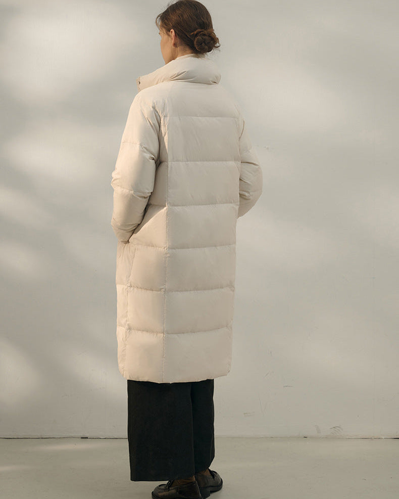 Cream over-knee quilted long coat back view