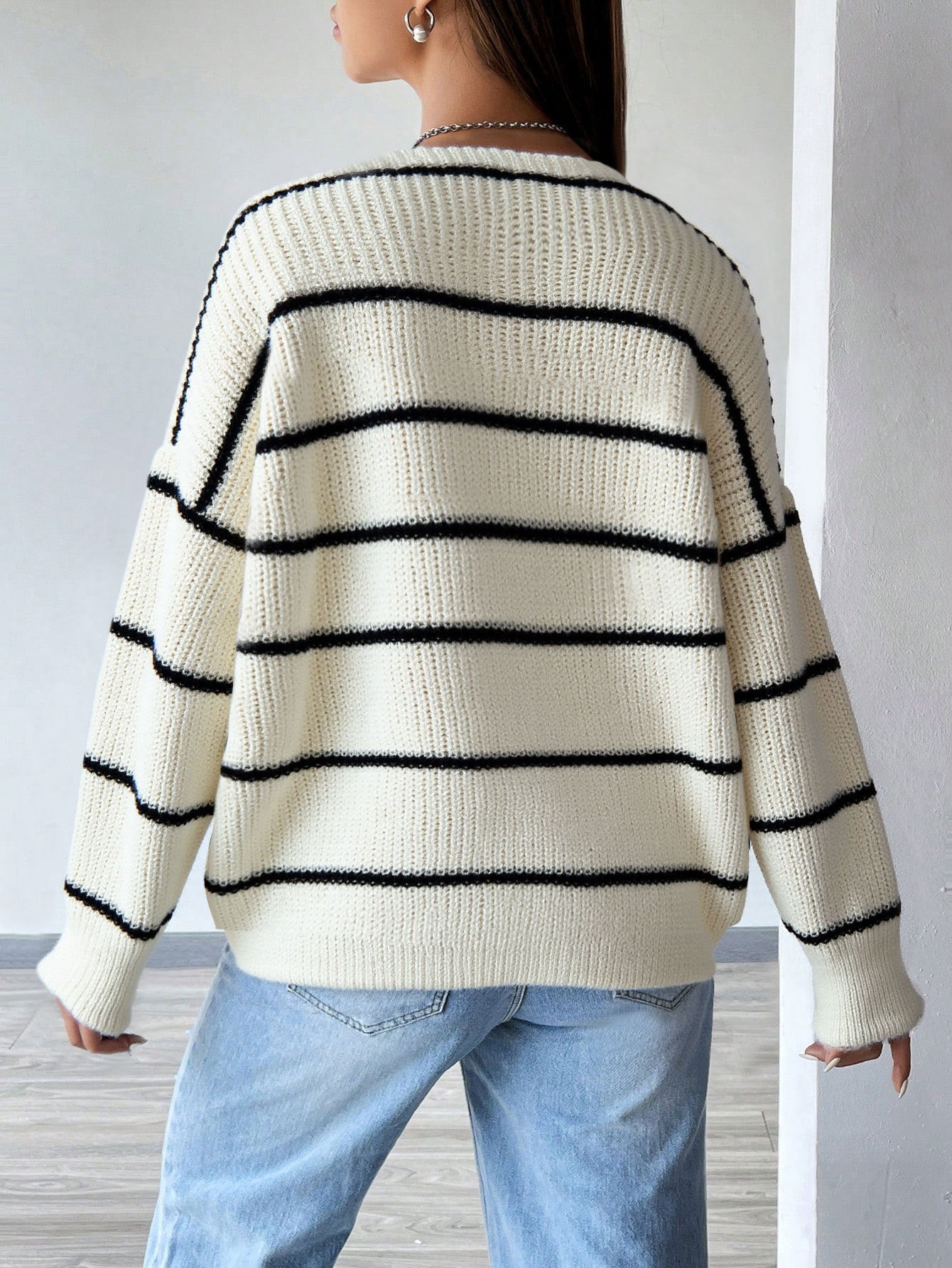 white striped cardigan back view relaxed knit