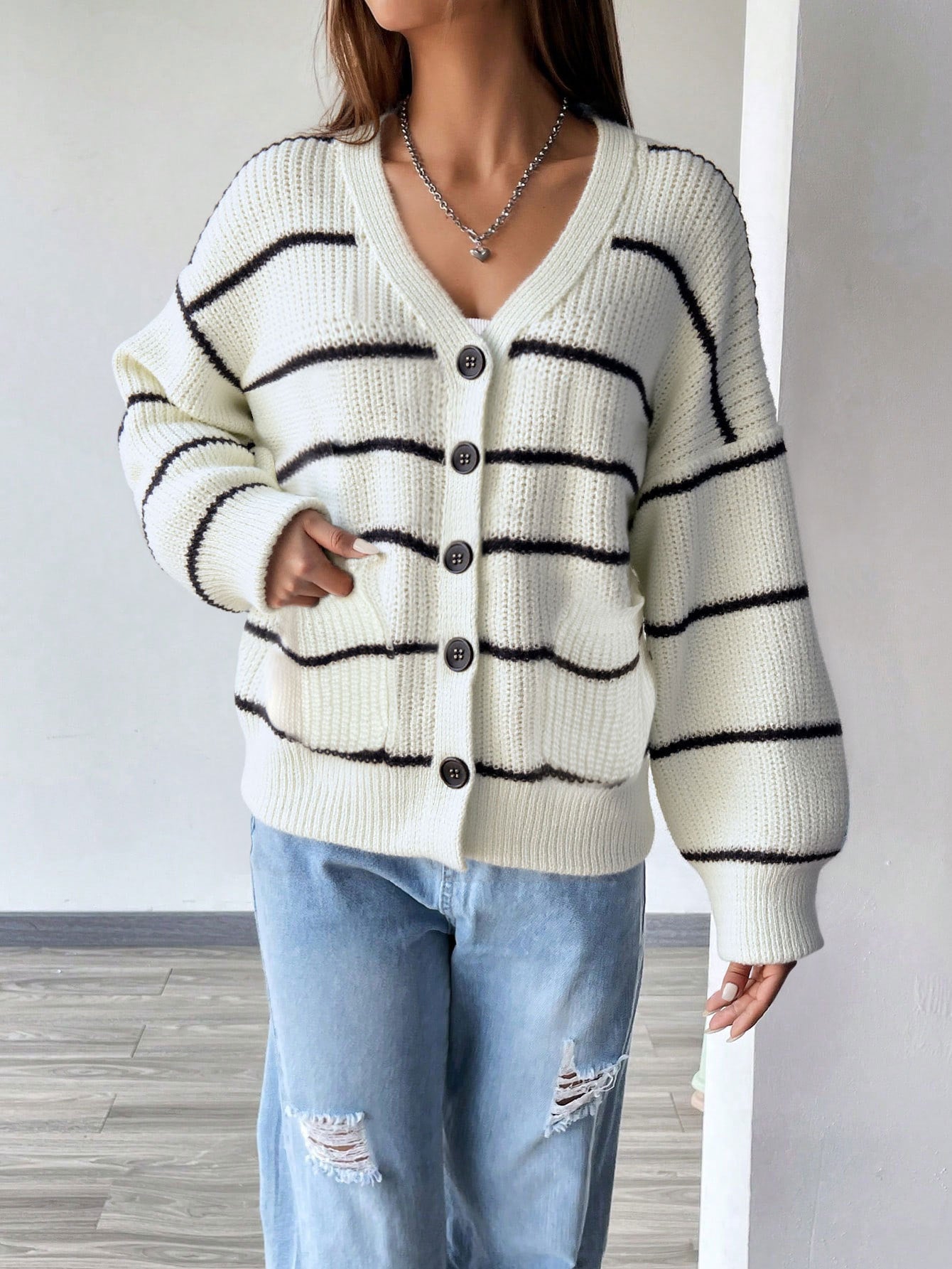white striped knit cardigan buttoned front casual