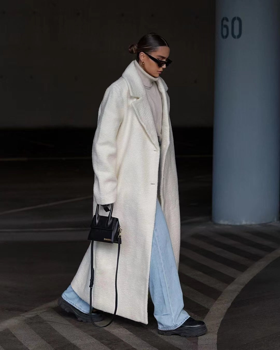 White teddy lapel coat, parking lot scene, layered with denim