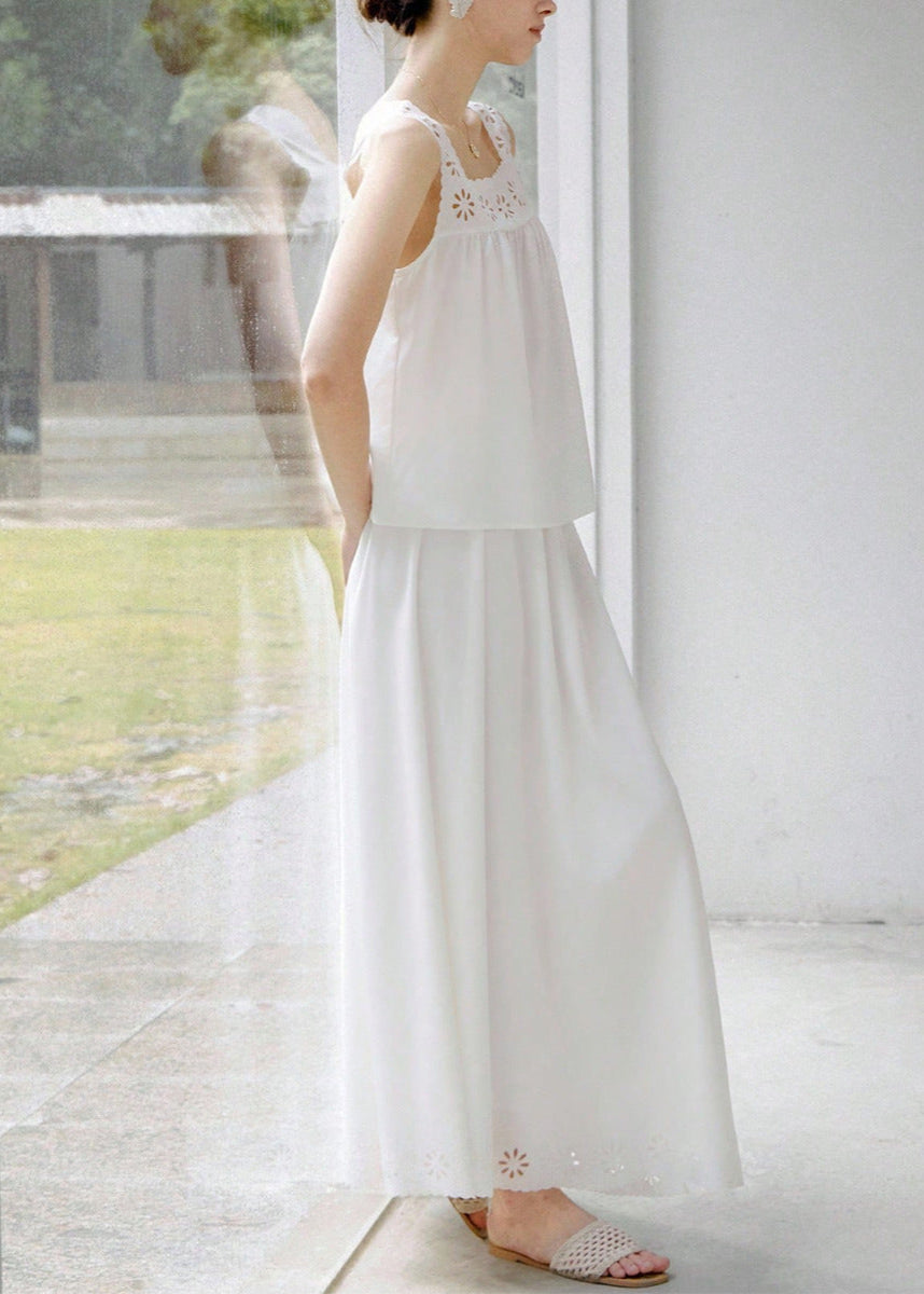 Side angle of white flowy two piece skirt set