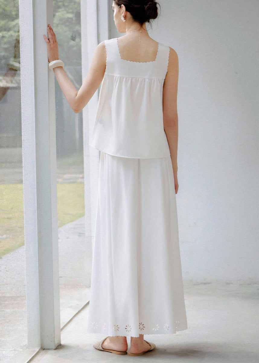 Back view of white sleeveless two piece summer outfit