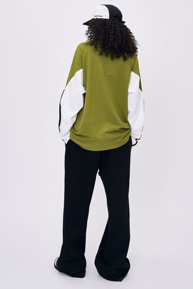 Woman back view in green retro contrast long sleeve t-shirt