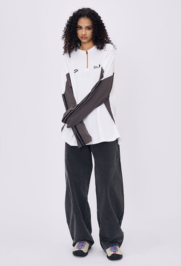 Woman wearing white retro contrast long sleeve t-shirt with casual pants
