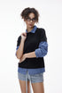 Women’s oversized black layered polo t-shirt with plaid sleeves, chic casual campus fashion look