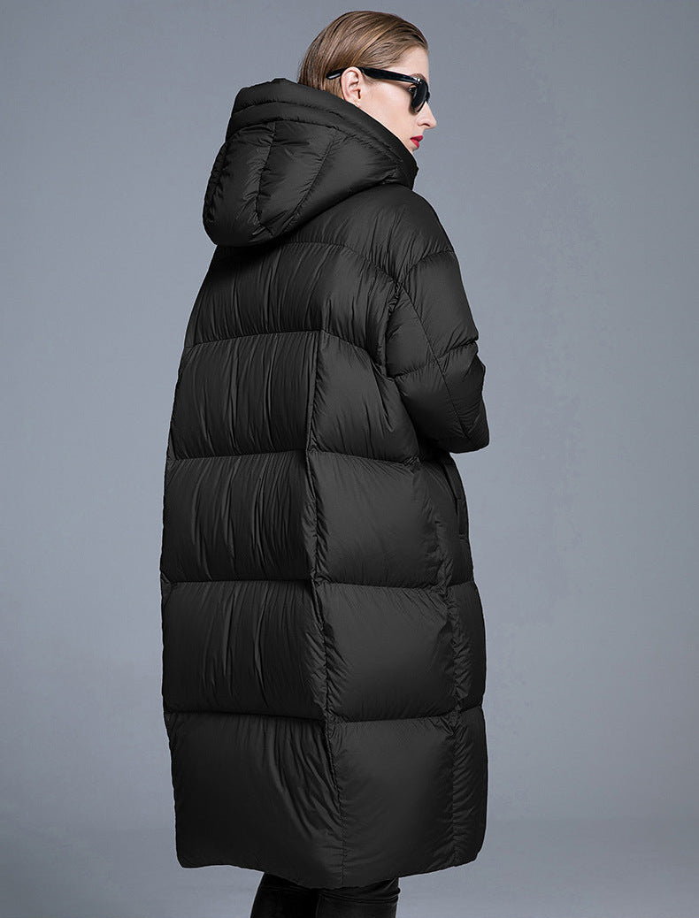 Black long hooded puffer coat for women with glossy finish and relaxed fit