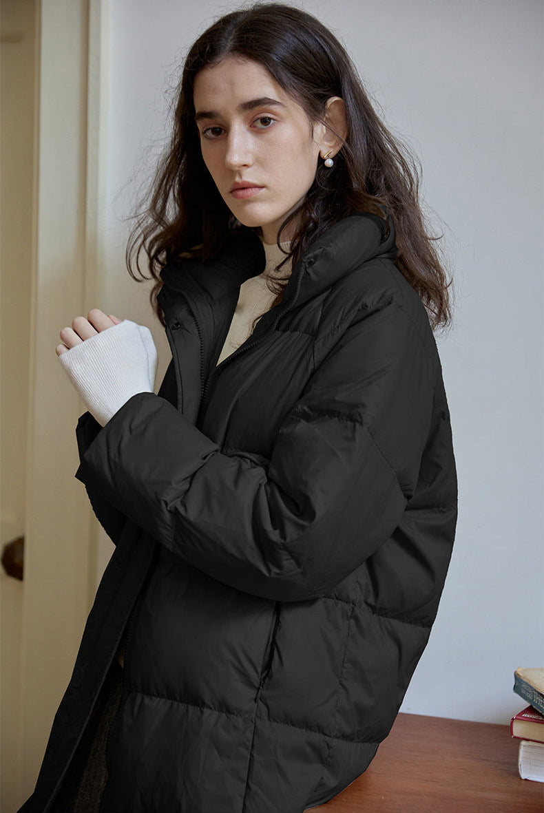 Black long quilted down coat with stand collar and relaxed winter fit