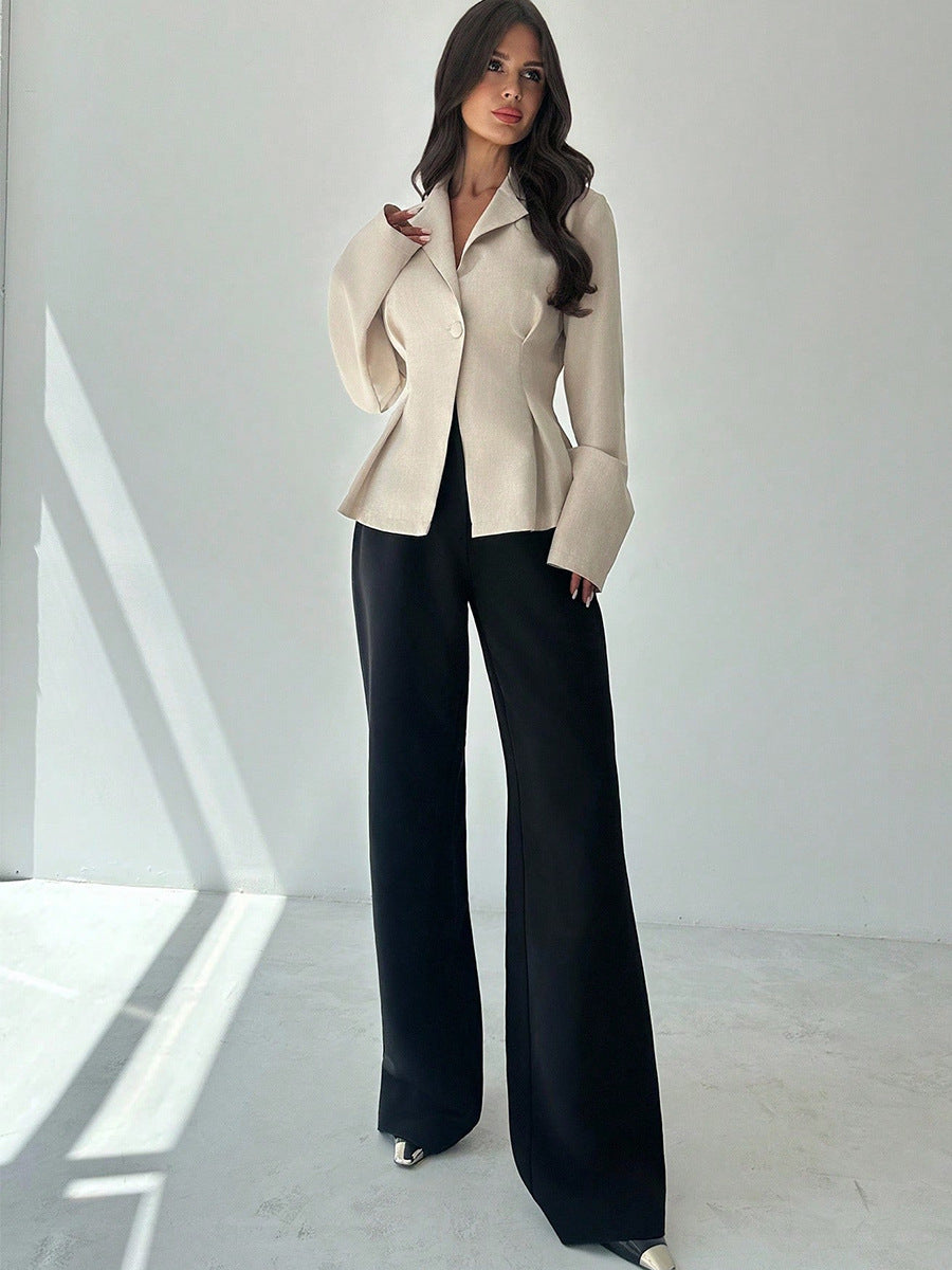 full-length women’s beige blazer with black wide-leg trousers, slim fit