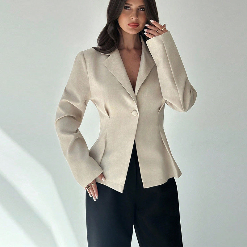 women’s beige blazer, lapel and one-button detail, front pose