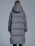 Back view of gray long hooded puffer coat for women with oversized down padding