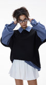 Women’s oversized layered polo t-shirt in black with plaid sleeves, casual school streetwear look