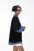 Women’s layered long sleeve polo top in black with plaid sleeves, trendy oversized school outfit