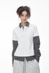 Women’s oversized white layered polo shirt with plaid sleeves, chic casual campus fashion