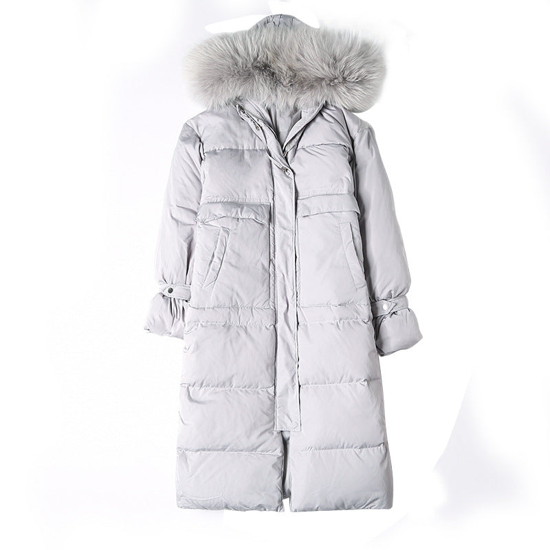 Gray long puffer coat flat lay with fur-trim hood and zip front