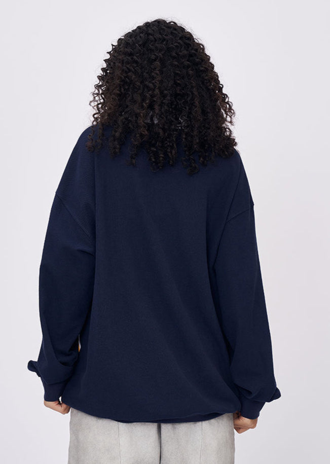 Women’s navy embroidered oversized polo collar long sleeve t-shirt back view