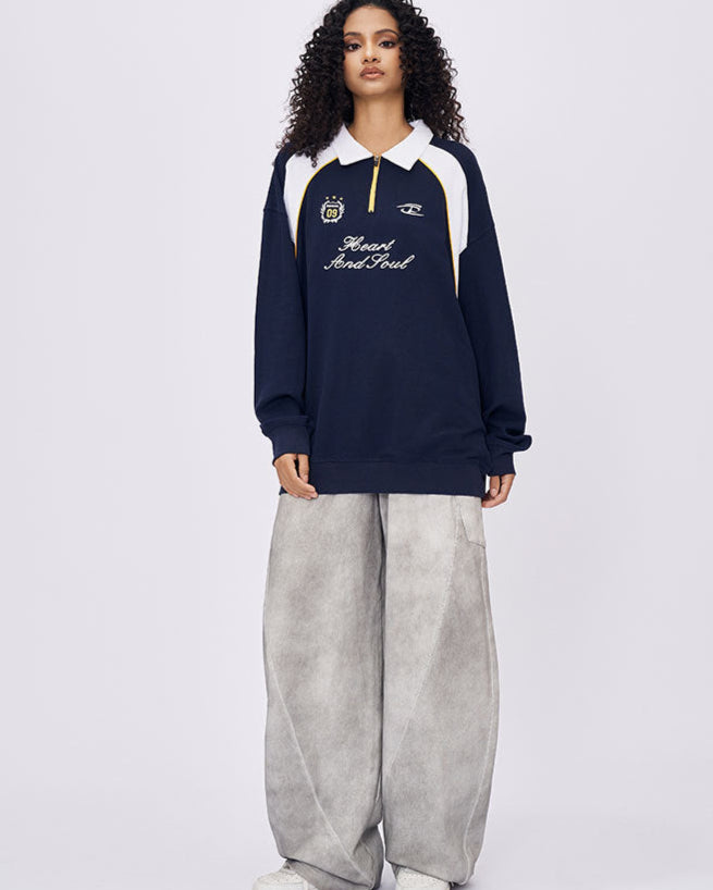 Women’s navy embroidered long sleeve t-shirt with polo collar and oversized fit