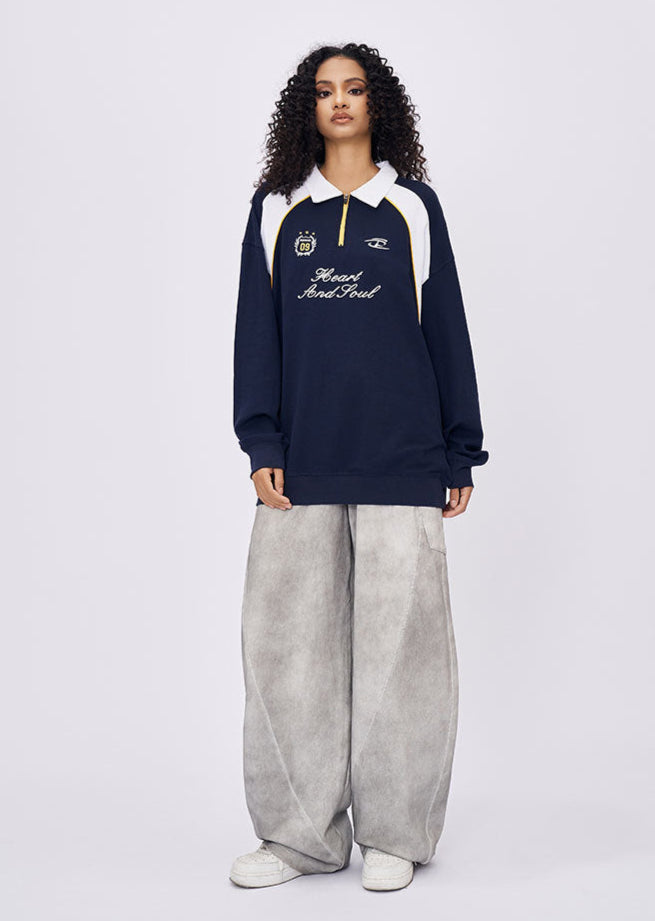 Women’s navy embroidered long sleeve t-shirt with polo collar and oversized fit
