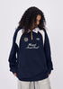 Women’s navy embroidered oversized polo collar long sleeve t-shirt side view