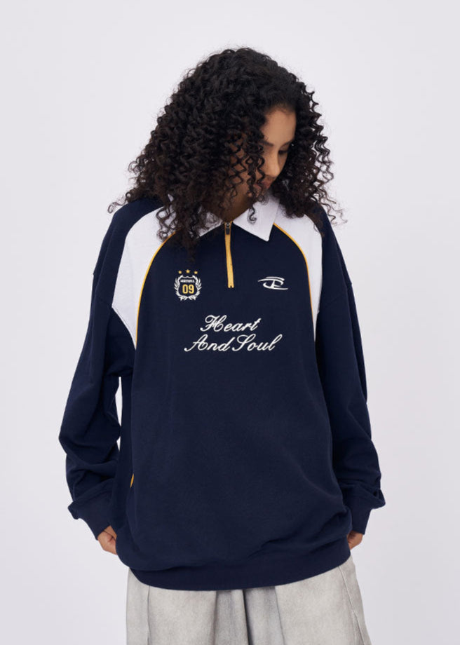 Women’s navy embroidered oversized polo collar long sleeve t-shirt side view