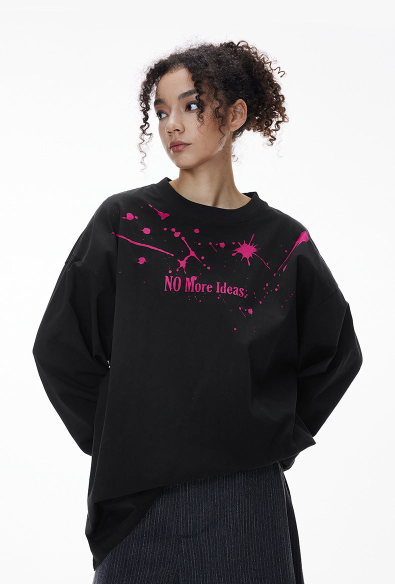 Female model wearing black "NO More Ideas" long sleeve t-shirt with pink print