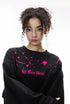 Woman front view black "NO More Ideas" oversized graphic long sleeve shirt