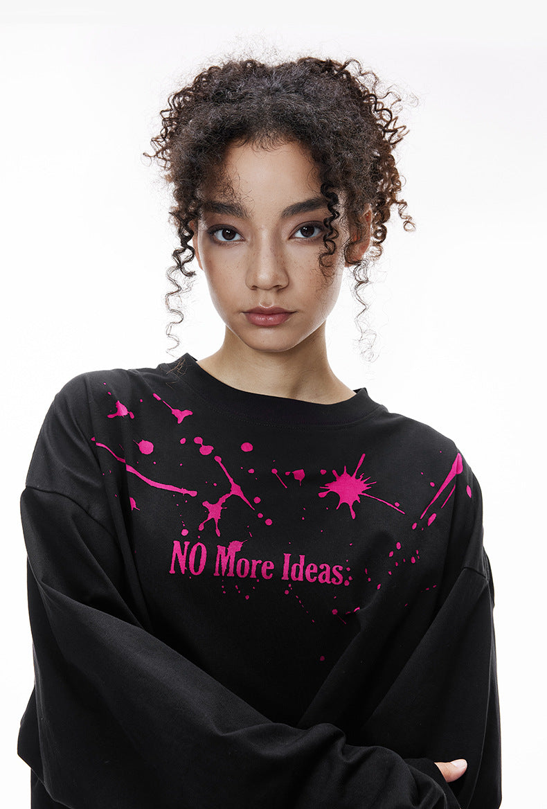 Woman front view black "NO More Ideas" oversized graphic long sleeve shirt