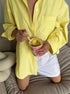 Women’s oversized striped yellow button down shirt lounge wear
