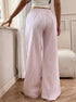 Women’s pastel pink striped wide leg drawstring pants spring summer in back view