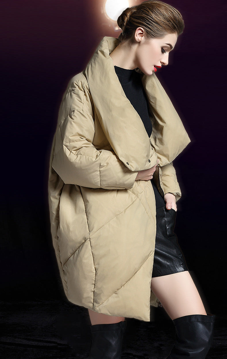 Side view of beige down puffer coat for women with relaxed silhouette