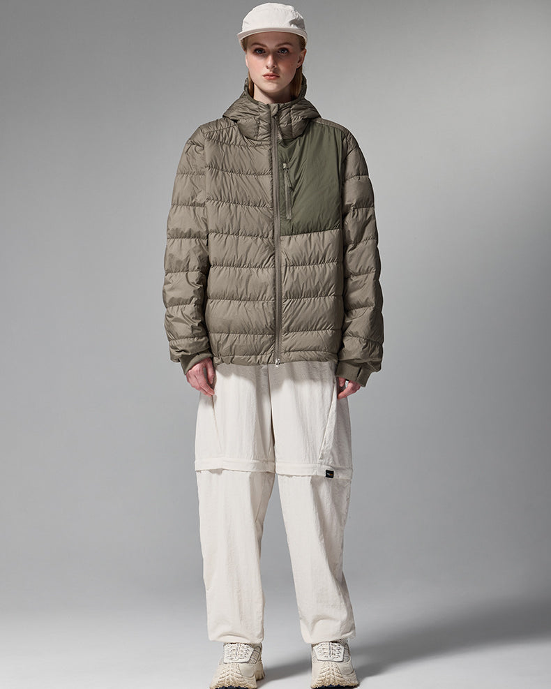 Brown women’s puffer jacket front on model, casual styling