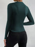 back view, slim fit green knit long sleeve top, clean waist and fitted sleeves