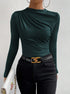 full front view, slim fit green ruched knit top with draped crew neck, styled with black belt