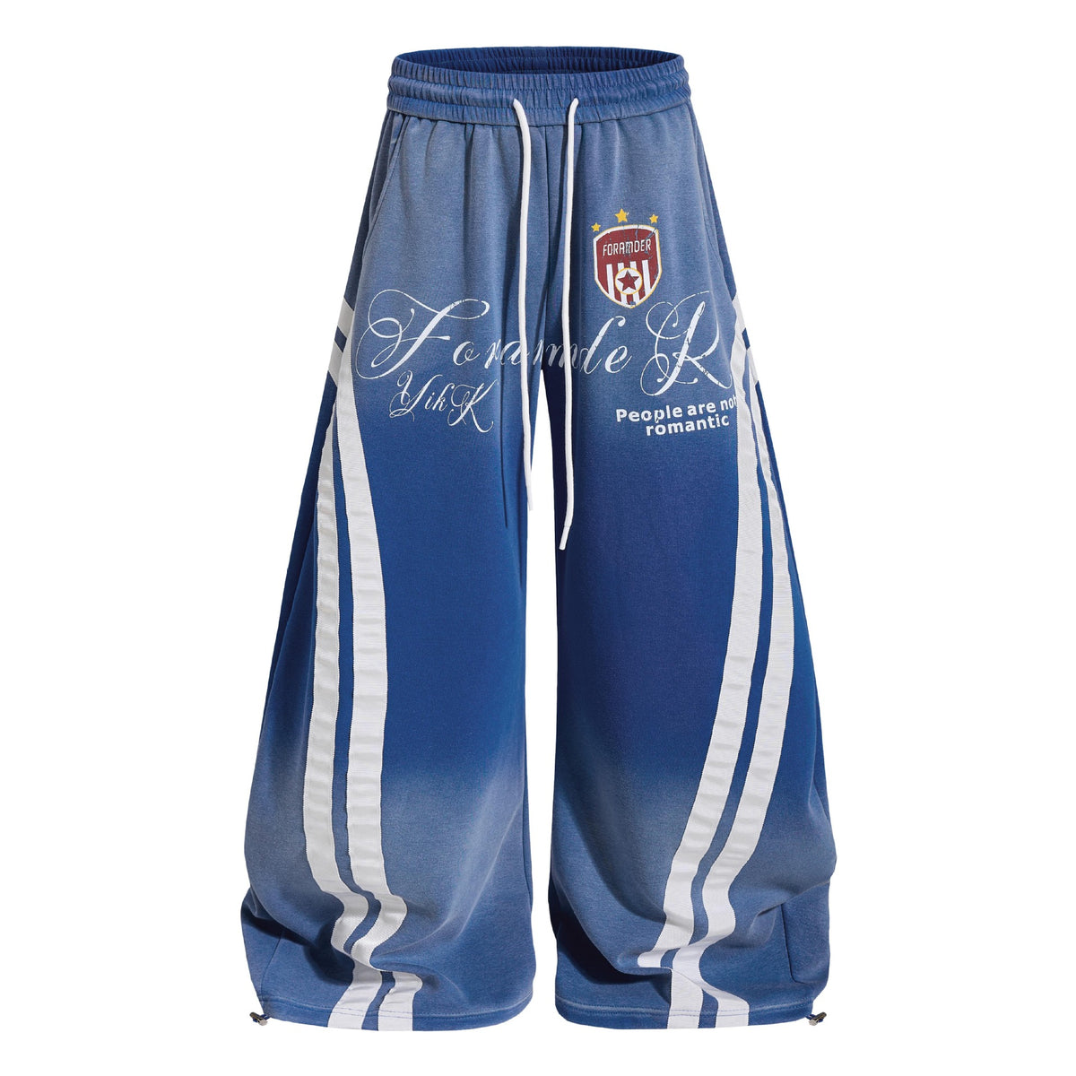 Product shot of washed blue gradient vintage baggy sweatpants featuring curved side stripes and toggle hem.