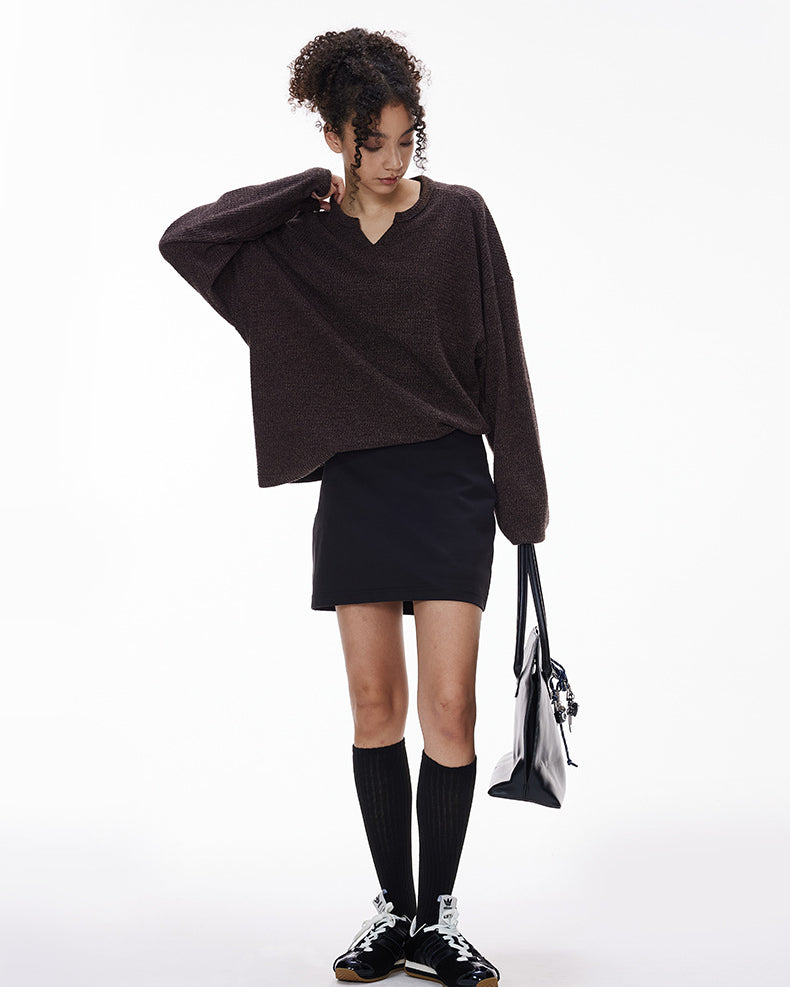 Women’s casual brown V-neck long sleeve t-shirt with mini skirt