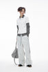 Women’s white layered polo t-shirt with gray plaid sleeves, oversized streetwear back-to-school top