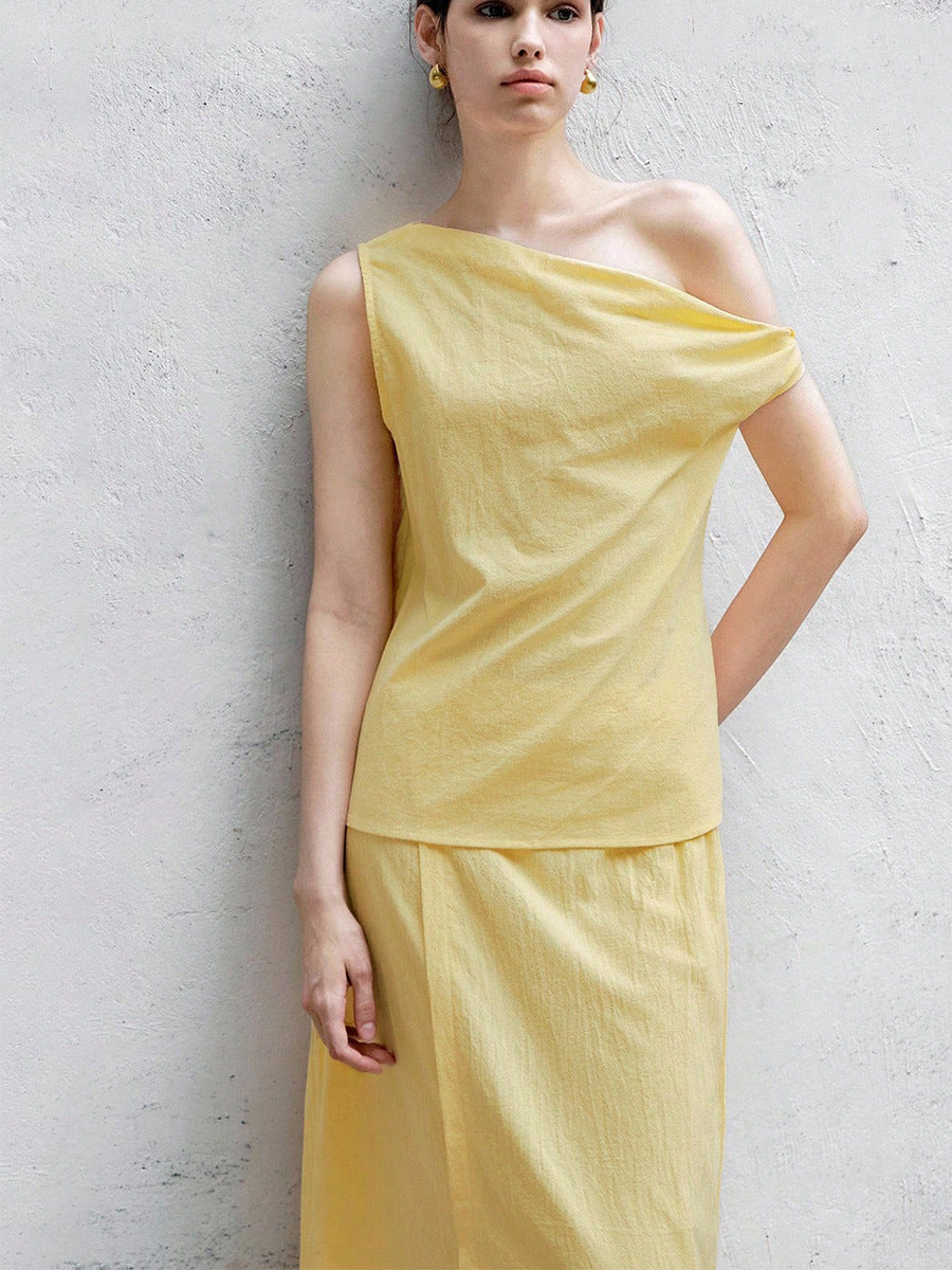 Women’s yellow skirt set with one shoulder top and slit midi skirt