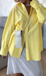 Women’s yellow striped oversized button down shirt casual style
