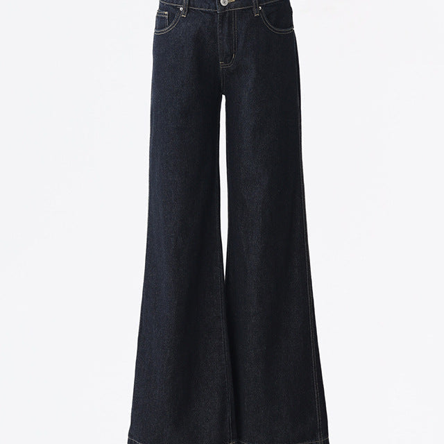 Flat lay of dark denim flare jeans with front button and zip closure