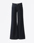 Flat lay of dark denim flare jeans with front button and zip closure