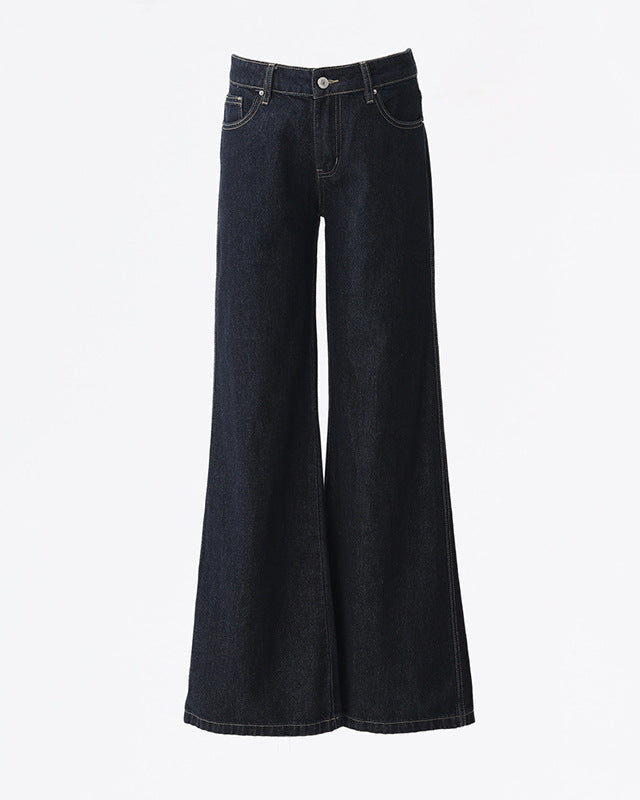 Flat lay of dark denim flare jeans with front button and zip closure