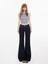 Front view of dark wash flared jeans with contrast stitching on female model