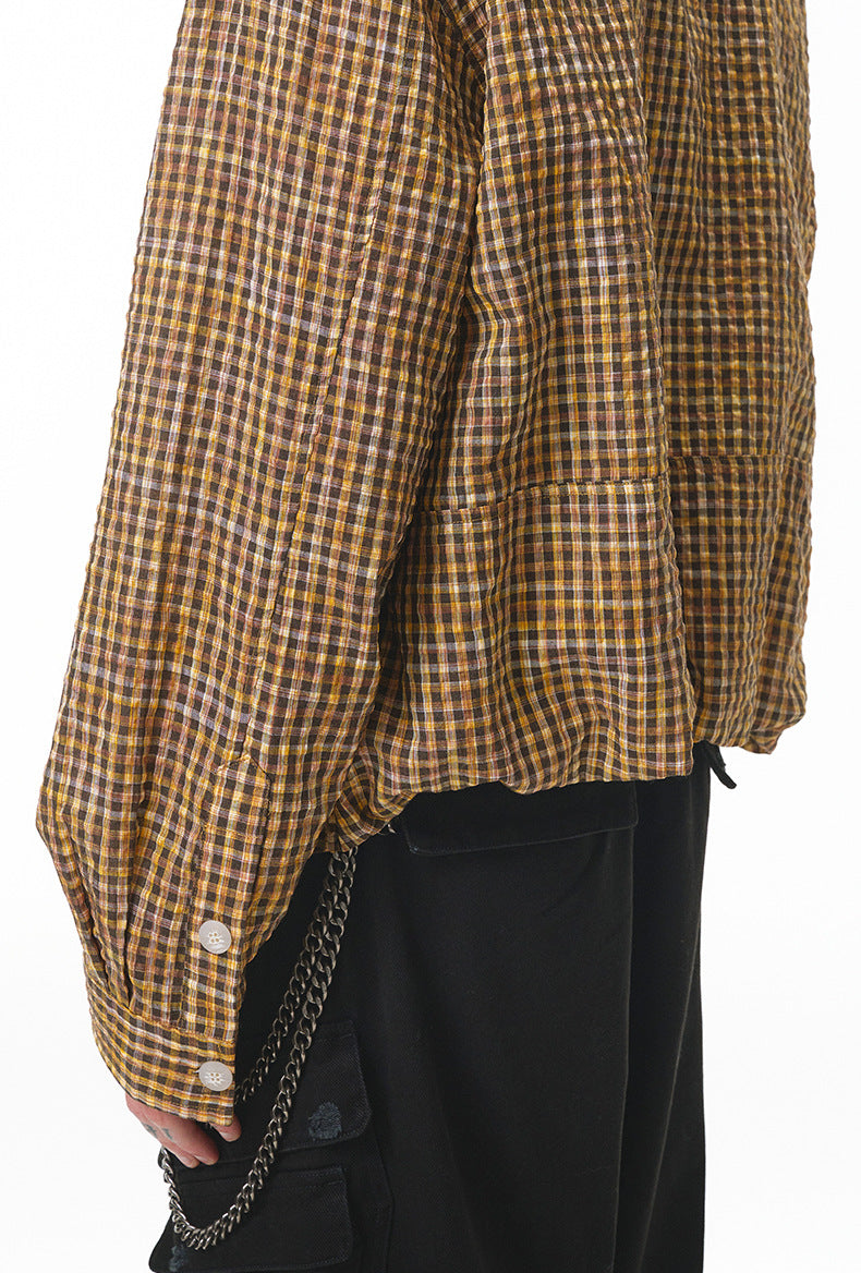 Yellow plaid shirt side view, sleeve drape and drop shoulder